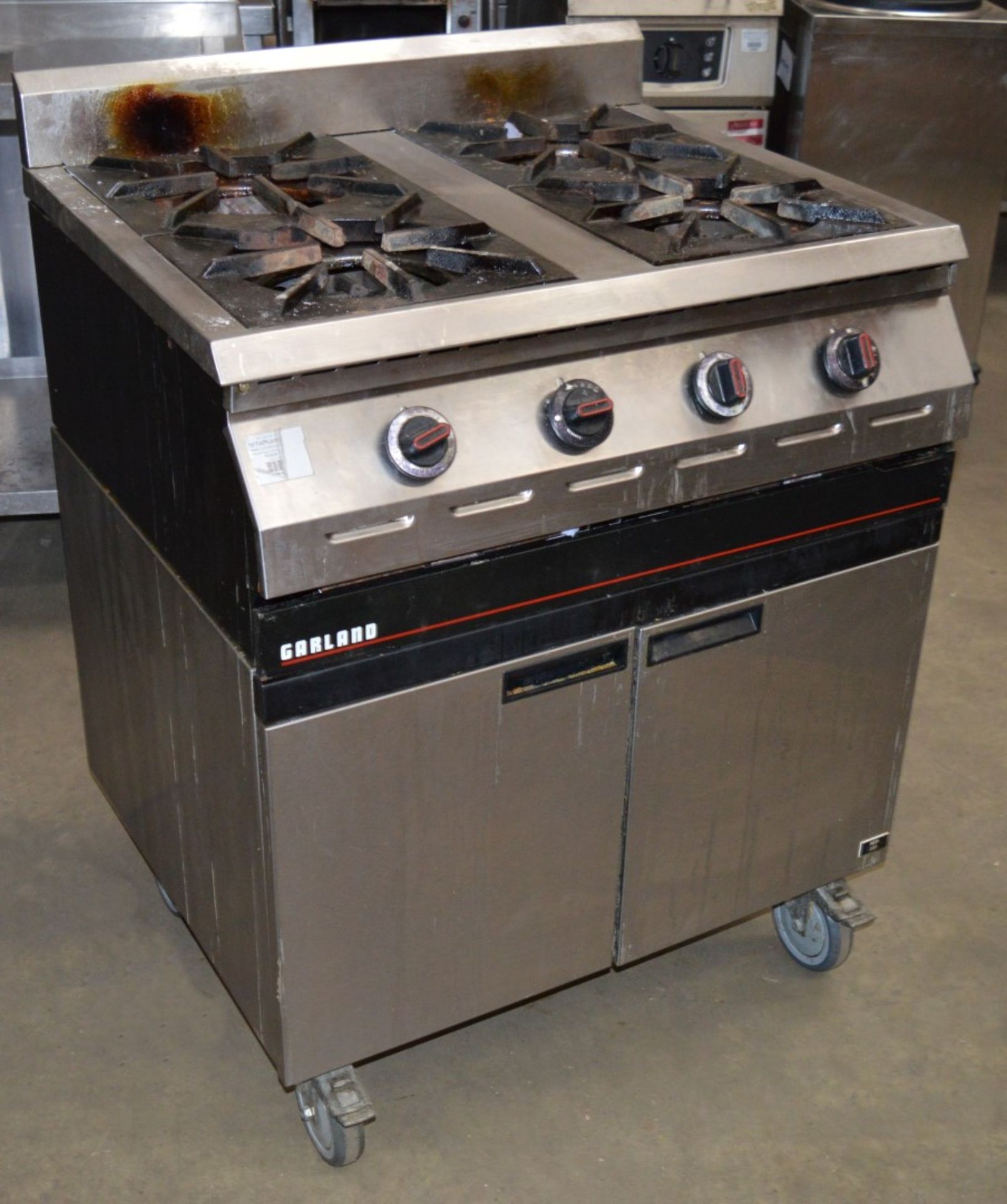 1 x Garland Commercial Range Cooker - Four Gas Burners - On Castors - Suitable For Professional