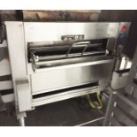 Duke Flexible Batch Broiler. Used in Burger King restaurants. Flame broils a batch of product