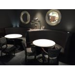 Section of Banquet Seating Featuring 2 High Back Brown Faux Leather Seating Booths With Fabric