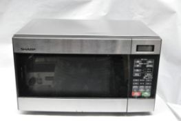 1 x Sharp 22 Liter Stainless Steel Microwave - Model R299T - Recently Taken From An Office