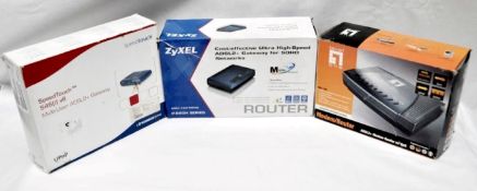 3 x Assorted Modems / Routers - Lot Includes: 1 x Speedtouch 546i, 1 x Zyxel P-660H, 1 x Level One