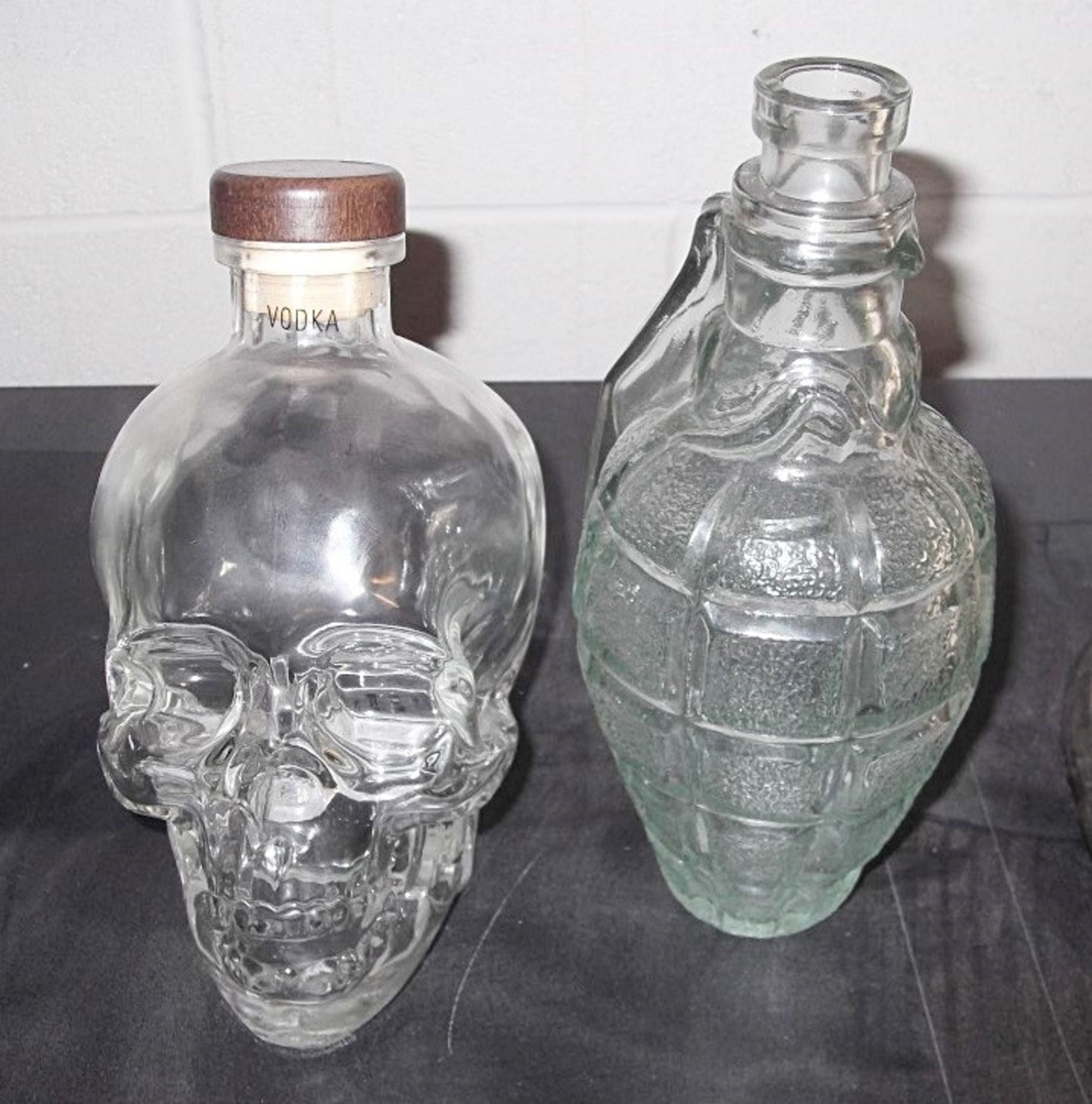 2 x Rare Novelty Glass Bottles / Decaters (empty) - Includes 1 x Skull, and 1 x Grenade Shaped -