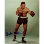 BOXING: Small selection of signed 8 x 10 photographs by various boxers comprising Archie Moore (