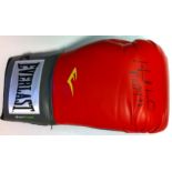 HOLYFIELD EVANDER: (1962- ) American Boxer, World Heavyweight Champion 1990-92. A red Everlast