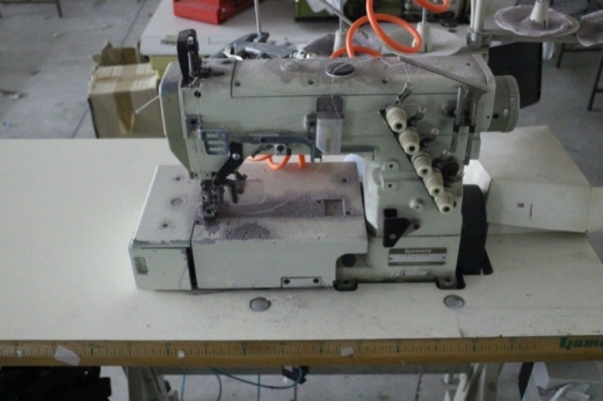 1,LOT COMPOSED OF: n.1 serger machine Yamato europa mod. "dcz-520-d10"; n.1 serger machine Yamato