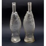 Due bottiglie a forma di pesce cm. 36. Primi 900