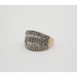 Anello in oro giallo 9kt. con diamanti taglio brillante e taglio a baguette ct. 1,40 circa