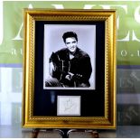 An exclusive Elvis Presley Framed autograph montage certificated and authenticated, Insured £2495