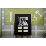 A framed Fawlty Towers signed by John Cleese, Andrew Sachs, Prunella Scales and Connie Booth