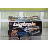 A vintage boxed 'Bigtrax' electronic car in mint condition