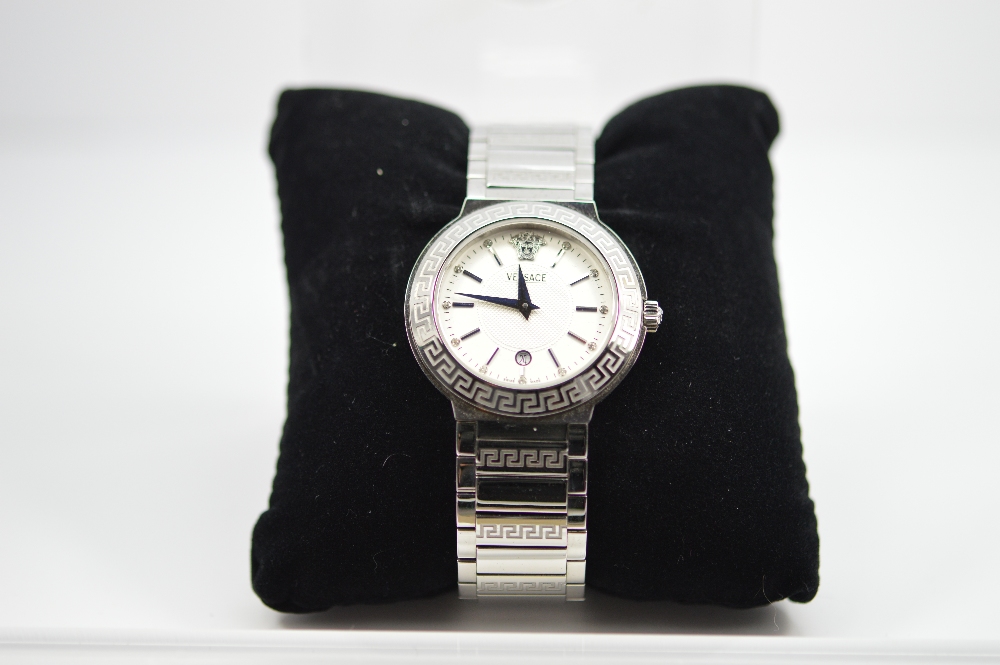 A Gent`s Versace Watch in original box etc