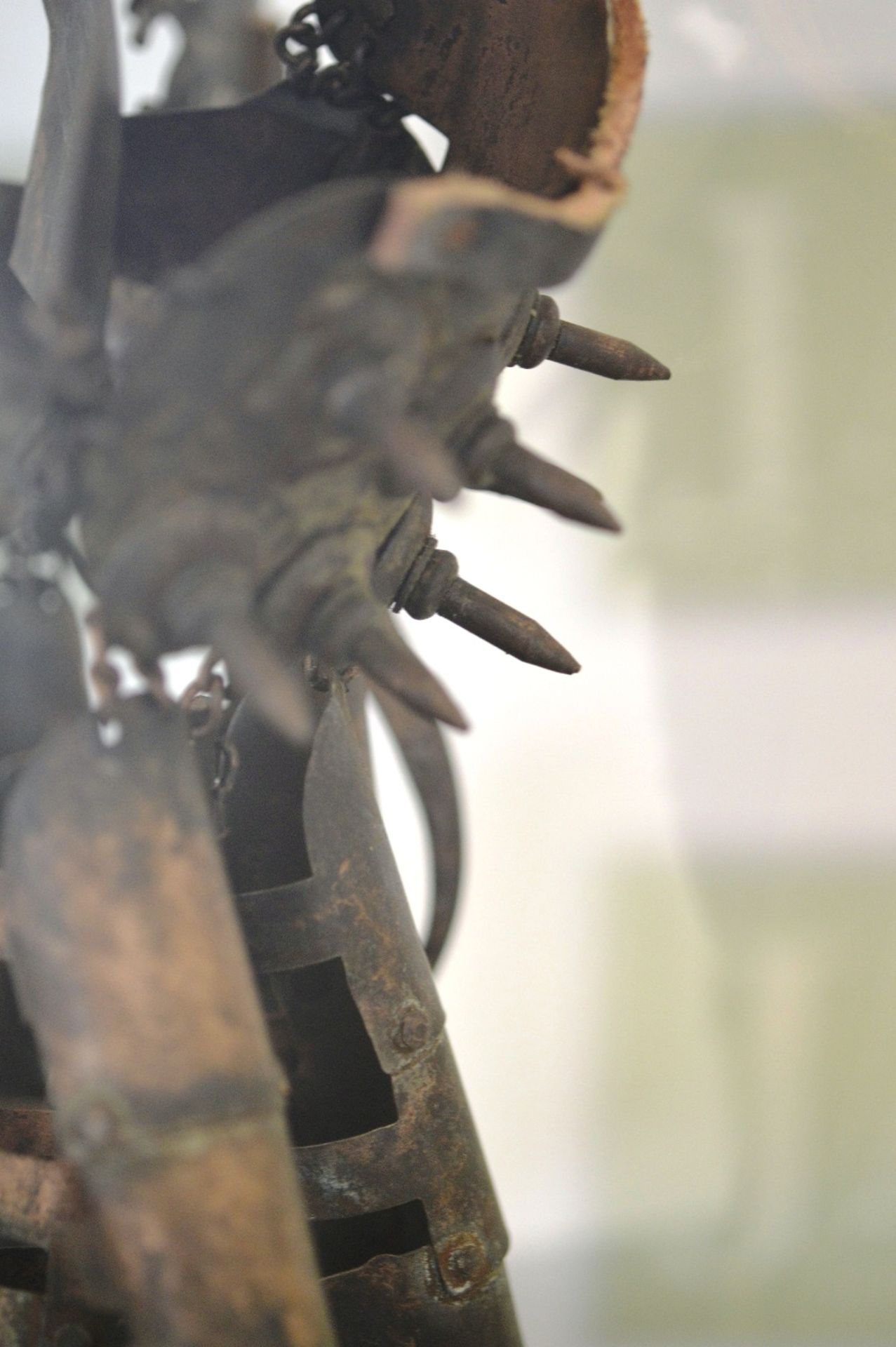 A pair of metal spiked Japanese fighting gloves, signs of use..comes in display case - Image 2 of 3