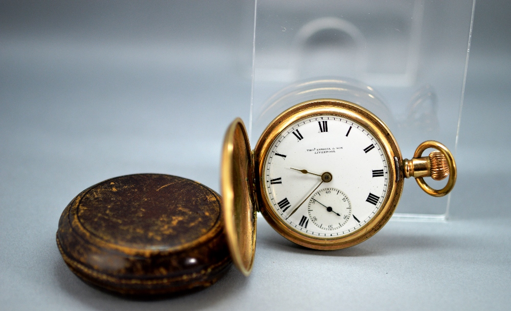 An antique gold plated pocket watch in original case