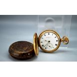 An antique gold plated pocket watch in original case