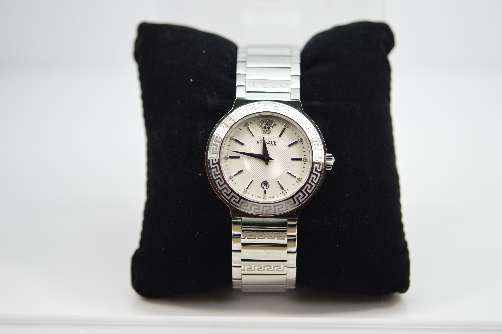 A Gent`s Versace Watch in original box etc