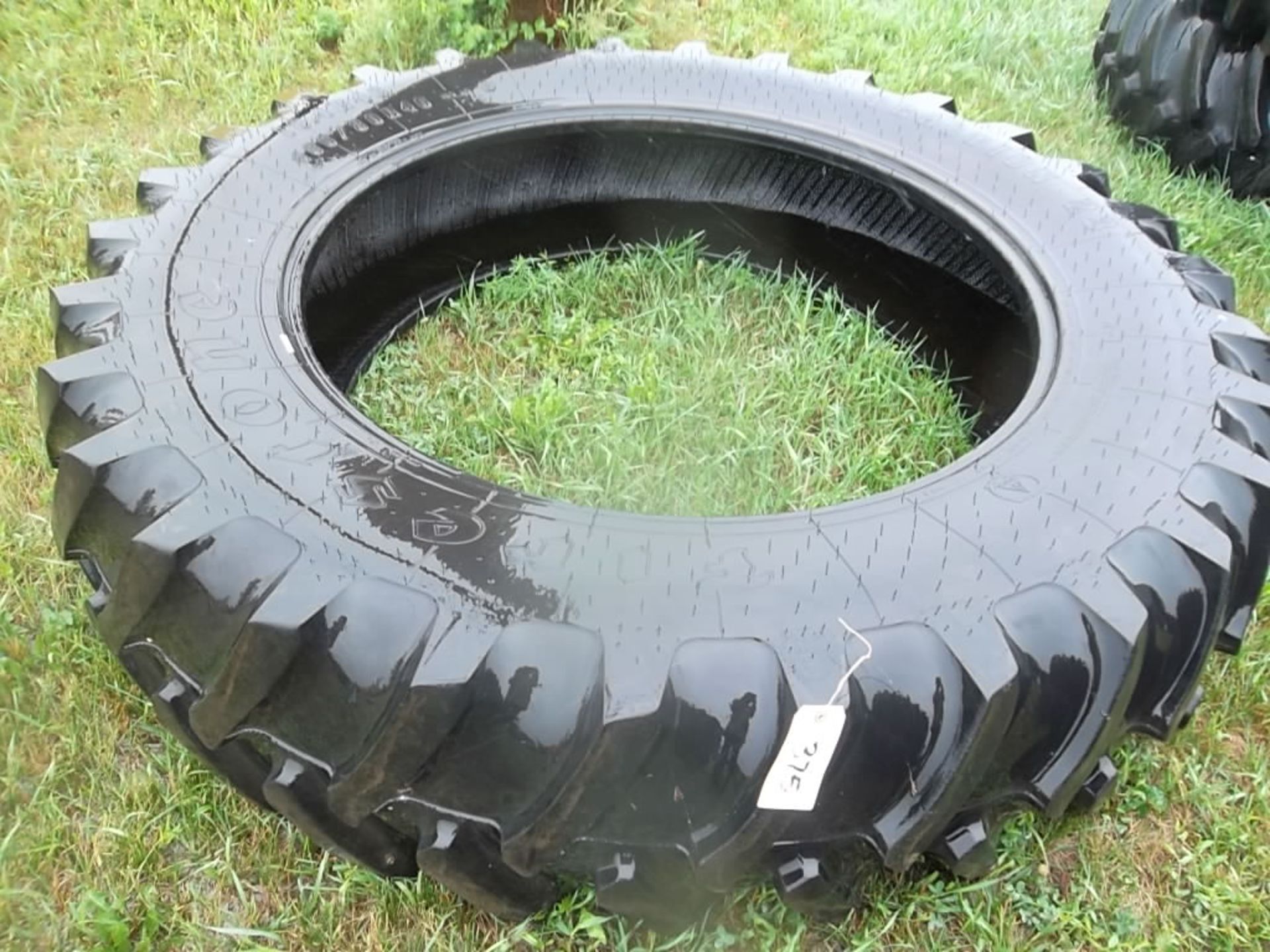 Lot 375 1 FIRESTONE RADIAL ALL TRACTION 23 DEGREE 18.4R46 REAR TRACTOR TIRE( There is a 6% Sales