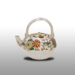 Imari tea pot, 19th centuryAn Imari ceramic teapot in design of chrysanthemums and vines. The handle