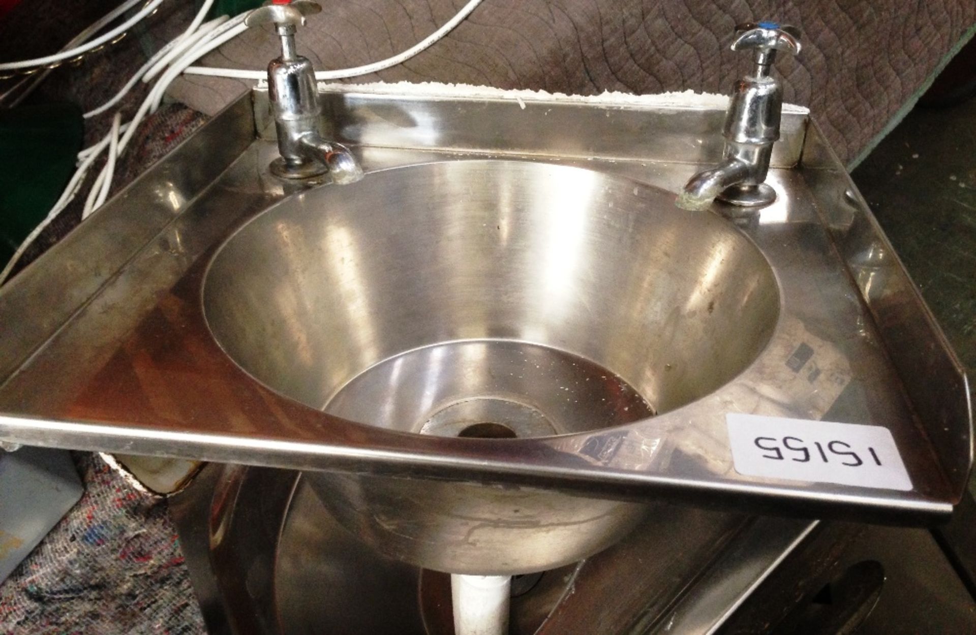 Stainless steel handwash basin with taps