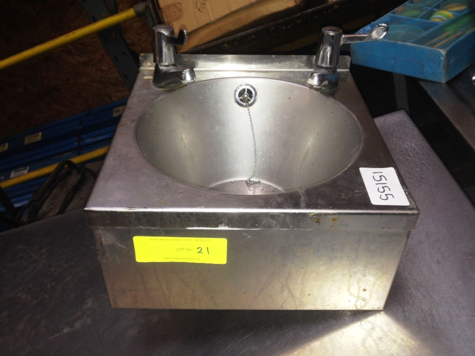 Stainless steel handwash basin with taps