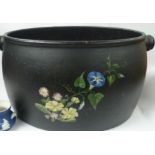 A Merrick & Sons 2 1/2 gallon cast iron oval cooking pot with swing handle and hand painted wild