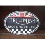 A cast metal reproduction wall sign for Triumph motor cycles.