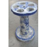 A blue and white china decorative stick stand, the scalloped top with five circular apertures raised