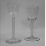 A Georgian cordial glass with opaque twist stem with central opaque column and one other with opaque