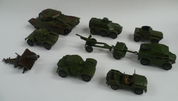 A collection of some eleven Dinky die cast military vehicles to include Field Artillery tractor,