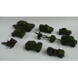 A collection of some eleven Dinky die cast military vehicles to include Field Artillery tractor,