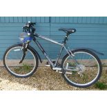 A gentleman's 18 speed Mongoose Rockadile Mountain bike with safety helmet and lock.