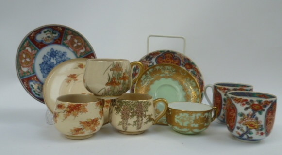 An assortment of Japanese porcelain tea wares to include Noritake, Imari and Satsuma designs,