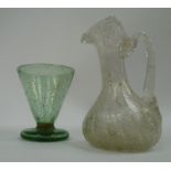 A miniature soda glass ewer and a green tapering conical tumbler.
