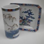 A cylindrical Japanese vase decorated with ornamental tree design (28cm high) and a square dished