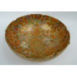 A Japanese porcelain thousand flower design Satsuma bowl with scalloped rim 21cm diameter.