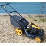 A Mc Cullogh M53 -625 lawn mower fitted with a Briggs and Stratton petrol engine and a grass box.