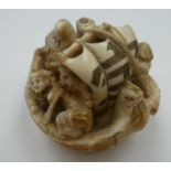 A Meiji ( meeting CITES regulations ) period carved ivory Takarabune okimono with chicken head bowed