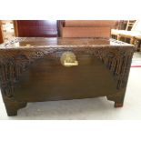 A 1950s Chinese camphor chest with carved bamboo decoration.