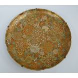 A Japanese porcelain thousand flower design Satsuma plate with scalloped rim, 30cm diameter.