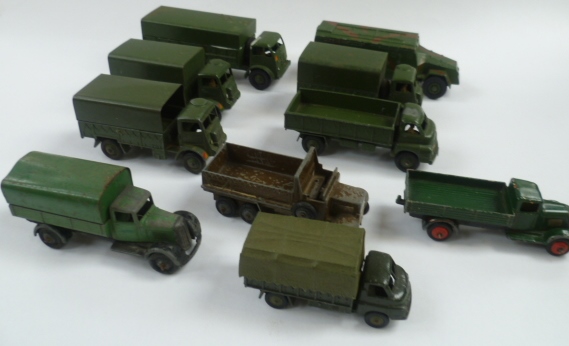 A collection of some ten Dinky die cast military trucks.