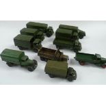 A collection of some ten Dinky die cast military trucks.