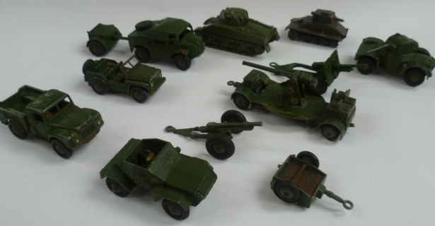 A collection of some eight Dinky die cast tanks and other military vehicles.