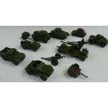 A collection of some eight Dinky die cast tanks and other military vehicles.