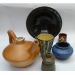 A small collection of studio pottery to include a wine jug, tumbler, two bowls, an egg cup and
