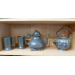 Two 'Roundhead' one pint pewter tankards, a Britannia metal teapot and a similar spirit kettle.