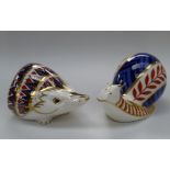 A Royal Crown Derby Imari palette paperweight in the form of a hedgehog (gold seal intact) and one