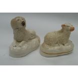 A Staffordshire pottery recumbent sheep figure raised on an oval base and a similar poodle.