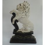 A Victorian painted cast iron rampant lion doorstep.