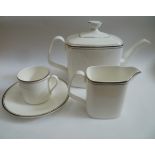 A near complete Royal Doulton Platinum Concord six place coffee and twelve place tea service to