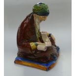 A Royal Doulton figurine, 'The Scribe' (HN324).