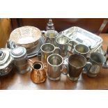 A collection of mainly pewter tankards, two pewter trays, a silver plated rose bowl and other